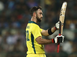 GLENN MAXWELL of Australia celebrates scoring his fifty runs during game of the T20I Series between India and Australia at M. Chinnaswamy Stadium on in Bangalore, India.