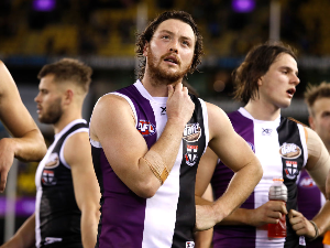 JACK STEVEN of the Saints looks dejected after a loss during the AFL match between the St Kilda Saints and the Richmond Tigers at Etihad Stadium in Melbourne, Australia.