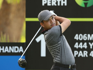 MIGUEL TABUENA of the Philippines watches his tee shot on the 18th hole during Day 1 of the ISPS Handa World Super 6 Perth at Lake Karrinyup Country Club in Perth, Australia.