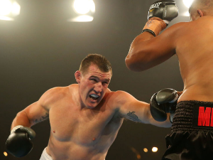 PAUL GALLEN punches JOHN HOPOATE during the Star of the Ring III Charity Fight Night at Hordern Pavilion in Sydney, Australia.