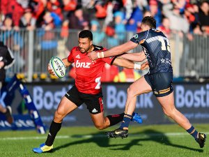 RICHIE MO'UNGA of the Crusaders charges forward during the round 8 Super Rugby match between the Crusaders and Brumbies at Christchurch Stadium in Christchurch, New Zealand.