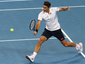 ROGER FEDERER of Switzerland plays a backhand during the Hopman Cup at RAC Arena in Perth, Australia.