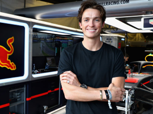 Olympic snowboarder SCOTTY JAMES of Australia poses for a photo outside the Red Bull Racing garage at Albert Park in Melbourne, Australia.