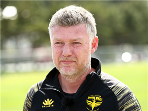 Coach UFUK TALAY talks to media during a Wellington Phoenix training session at Martin Luckie Park in Wellington, New Zealand.