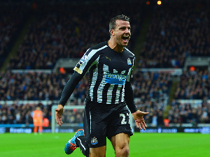 STEVEN TAYLOR of Newcastle United celebrates scoring the opening goal during the Barclays Premier League match between Newcastle United and Burnley in Newcastle upon Tyne, England.