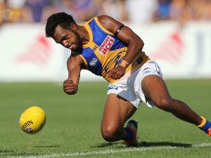 WILLIE RIOLI of the Eagles slaps the ball clear during the 2019 JLT Community Series AFL match between the Fremantle Dockers and the West Coast Eagles at Rushton Park in Perth, Australia.
