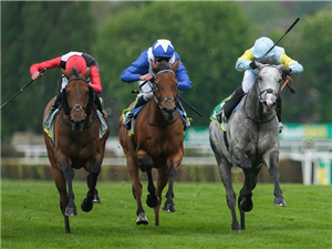 CHARYN (right) winning the Bet365 Mile at Sandown Park in Esher, England.