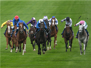 RULING COURT (centre, white cap) winning the 2000 Guineas Stakes at Newmarket in England.