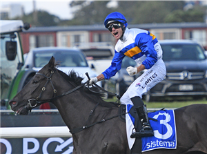 Expat Kiwi jockey Logan Bates is jubilant after recording his first Group One victory aboard Jigsaw in the Sistema Railway at Ellerslie on Saturday.