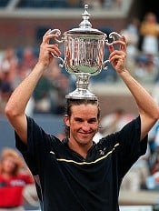 Patrick Rafter of Australia holds up his trophy after winning the men's singles finals match at the U.S. Open in New York Sunday, Sept. 7, 1997.
