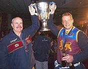 Brisbane Lions coach Leigh Matthews (left) and captain Micheal Voss celebrate winning the 2002 AFL Premiership. Melbourne, September 28, 2002.